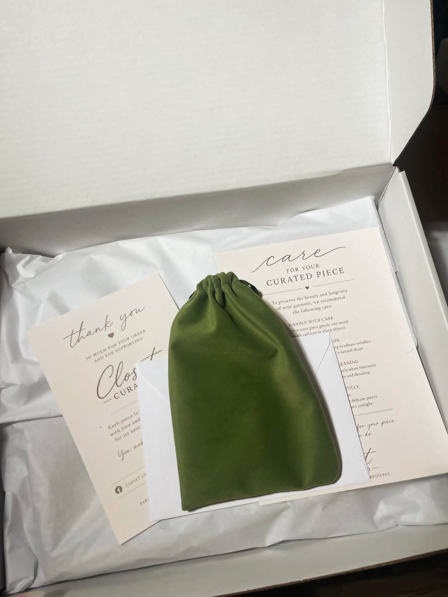 Closet Curated order with thank-you cards and care instructions in gift packaging.
