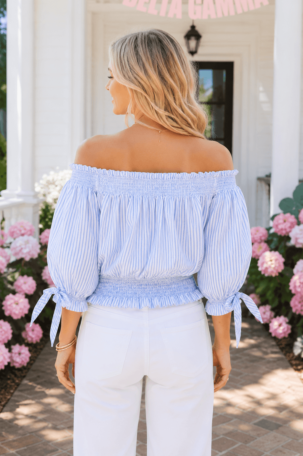 Caroline Constas Off-the-Shoulder Smocked Stripe Top