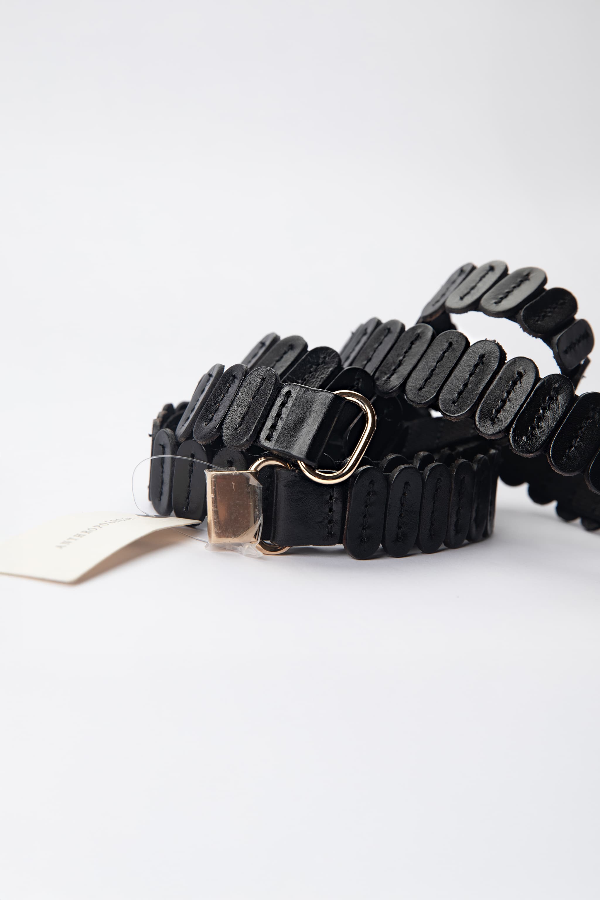Anthropologie Leather Disc Stretch Belt